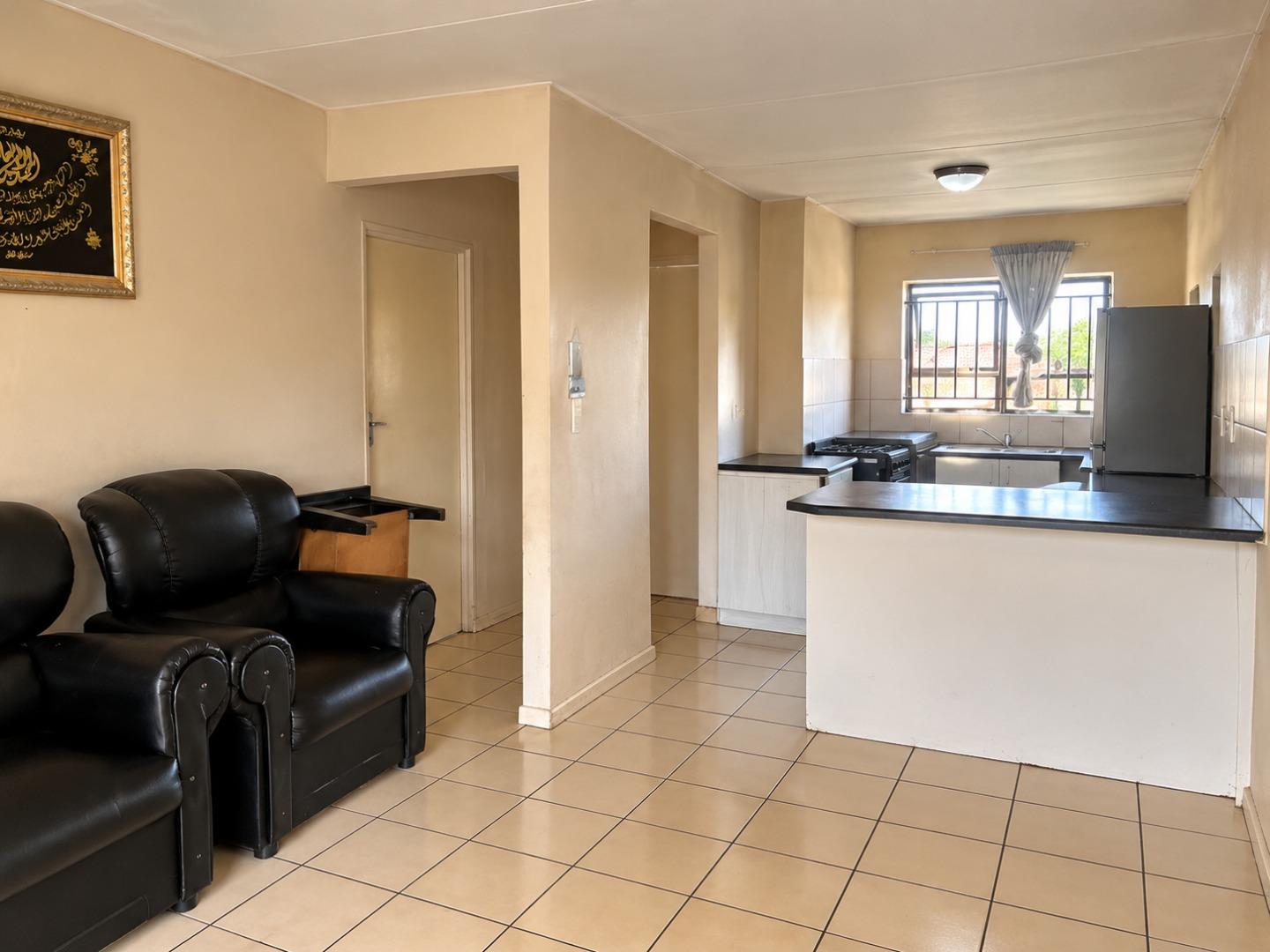 769723_Clean_Open-Plan_Living_and_Kitchen.jpg